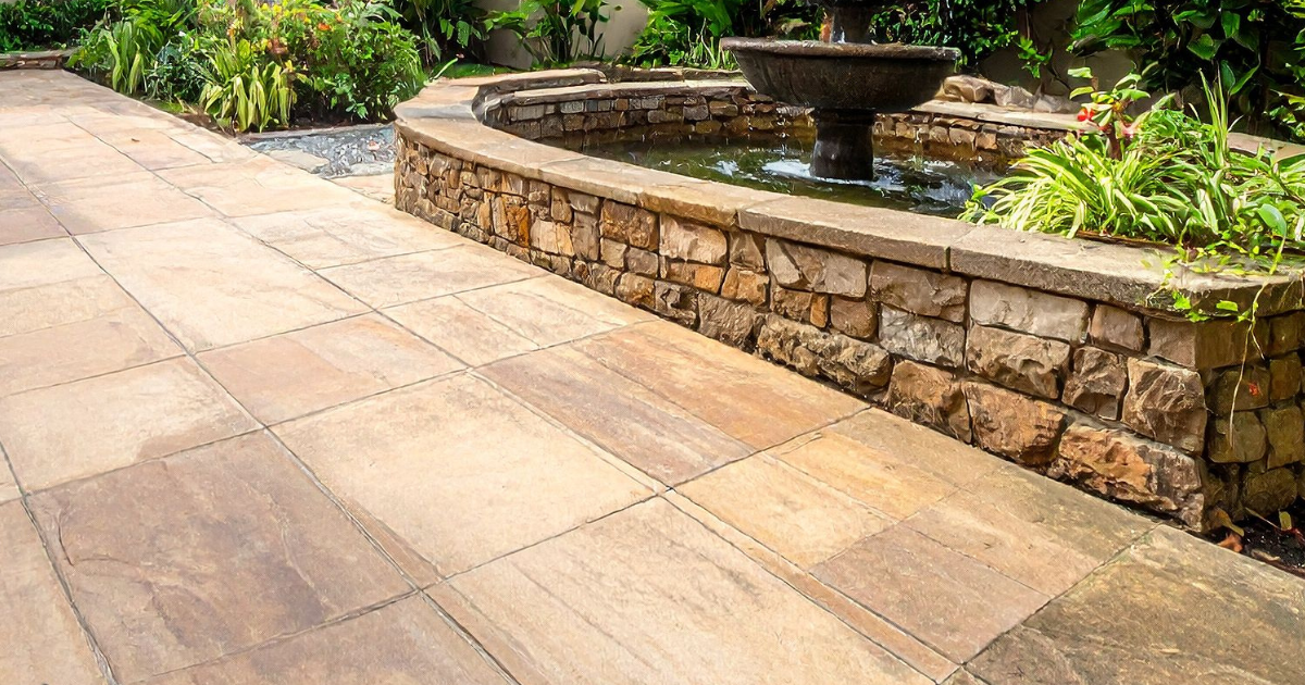 concrete patio installed beside of the pool