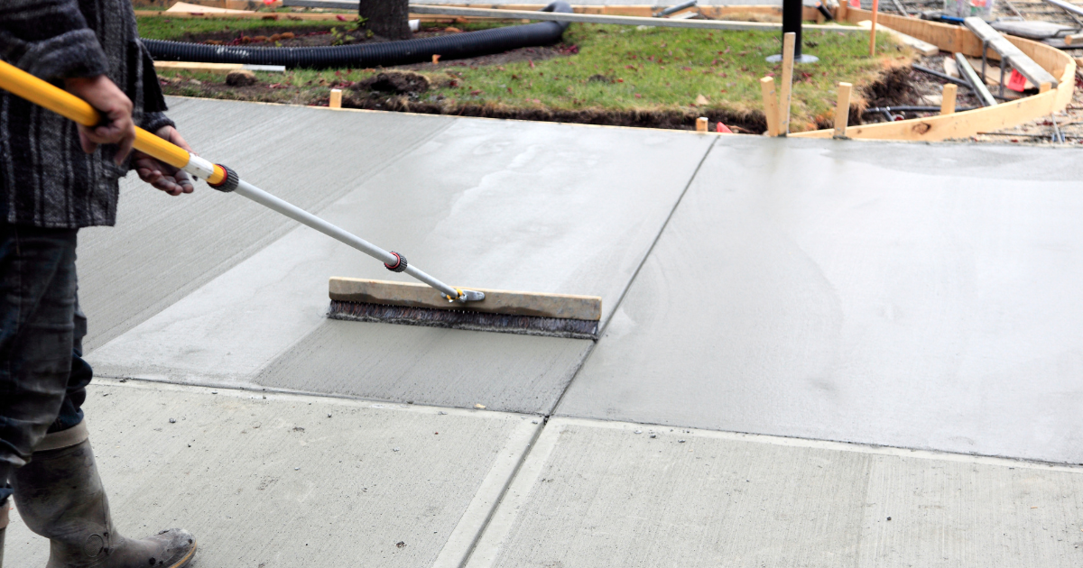 Expert from Premier Concrete FW executing a driveway replacement