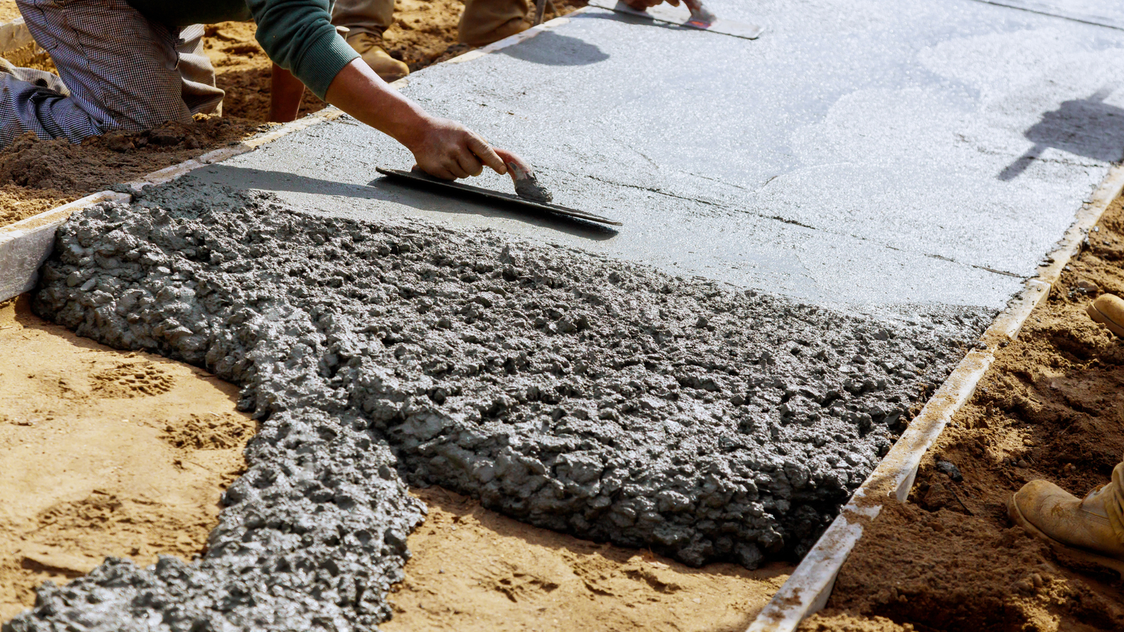 Professionals of Premier Concrete finishing a Commercial Concrete service